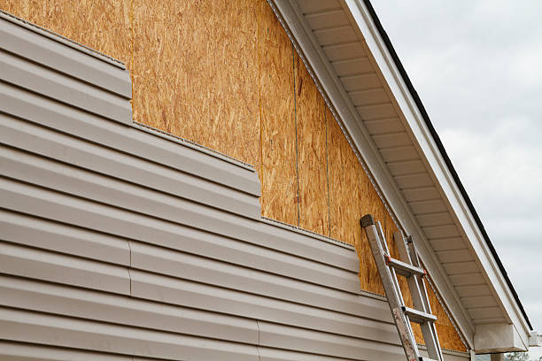 Professional Siding Installation technician working in Charlottesville, VA